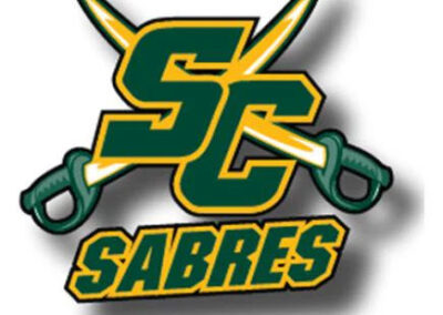 Street Justice sponsors the SC Sabres team, featuring the green and gold Sabres logo with crossed swords.